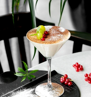 Espresso martini garnished with grapes